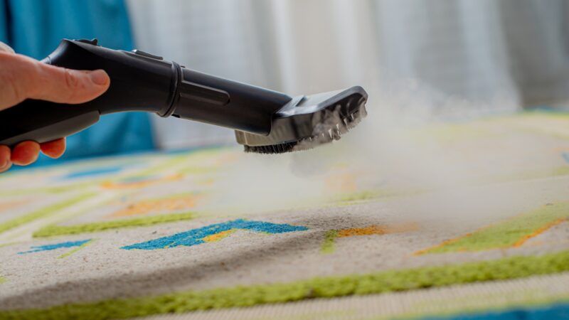 cleaning carpet in children's room with steam